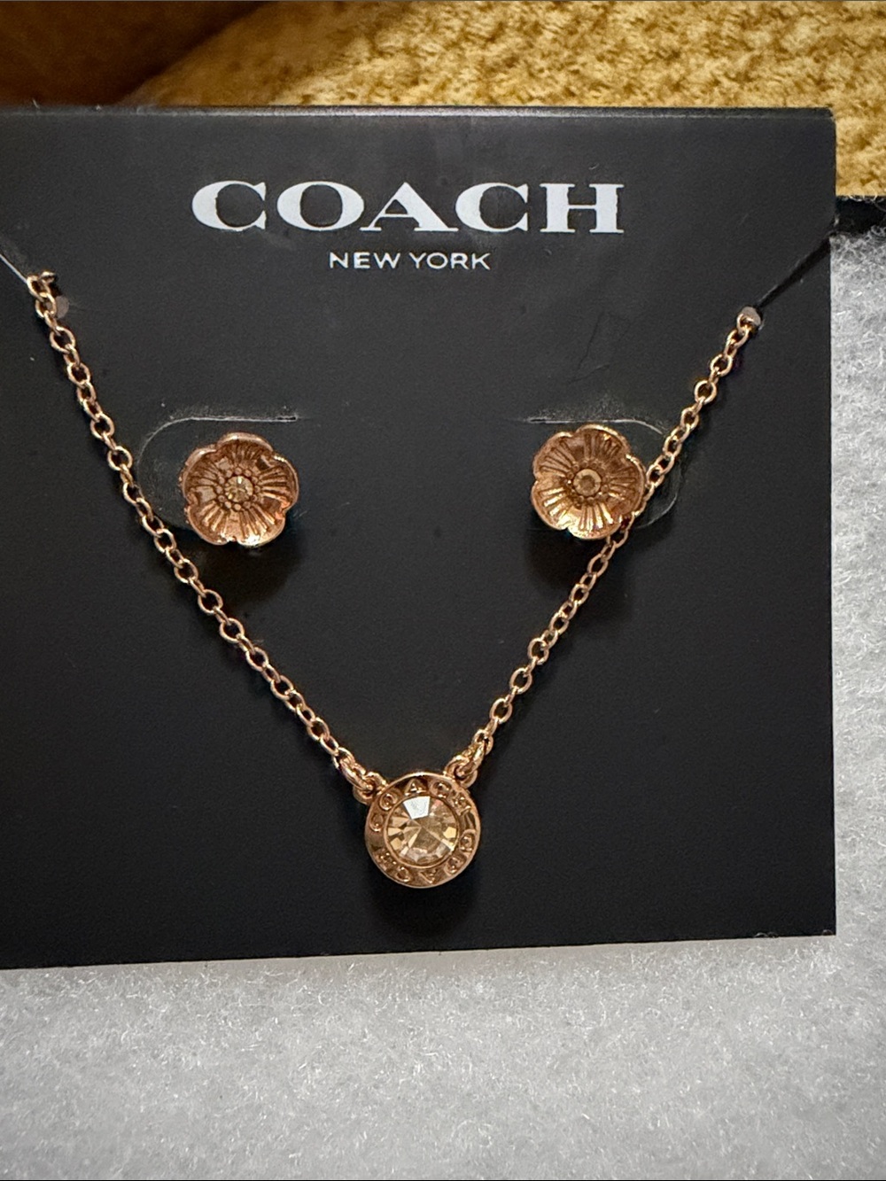 COACH Rose Gold Floral Pendant Necklace and Flower Stud Earrings